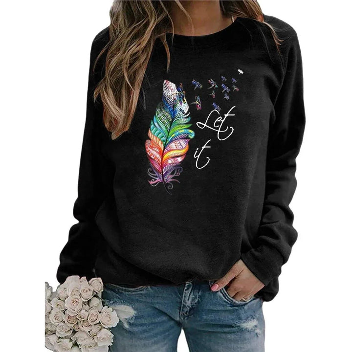 Black sweatshirt with colorful feather design and white text 'Let it' paired with blue distressed jeans