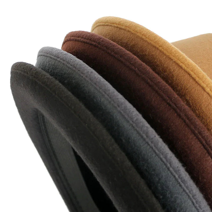 Stack of felt hats in black, gray, brown, and tan colors with rounded brims