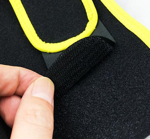 Hand opening black neoprene strap with yellow trim and Velcro fastener