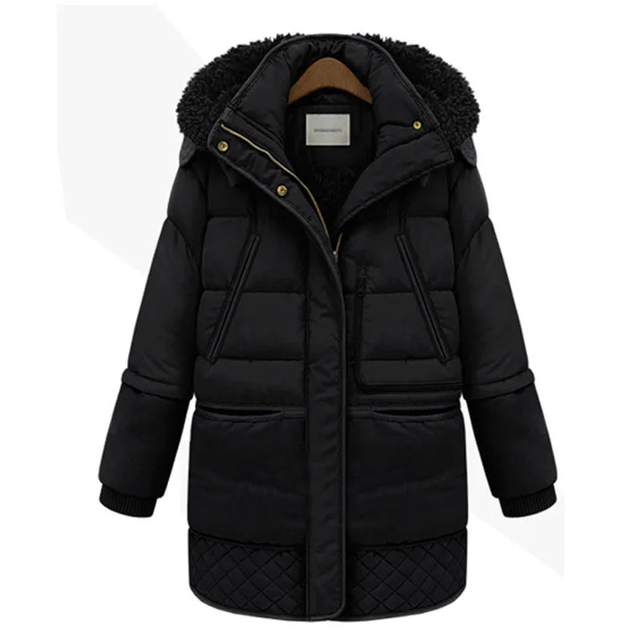 Black padded winter coat with quilted hem, zip and snap button closure, and faux fur-lined hood