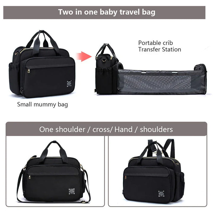 Black two-in-one baby travel bag with portable crib and multiple carrying options including shoulder and hand straps