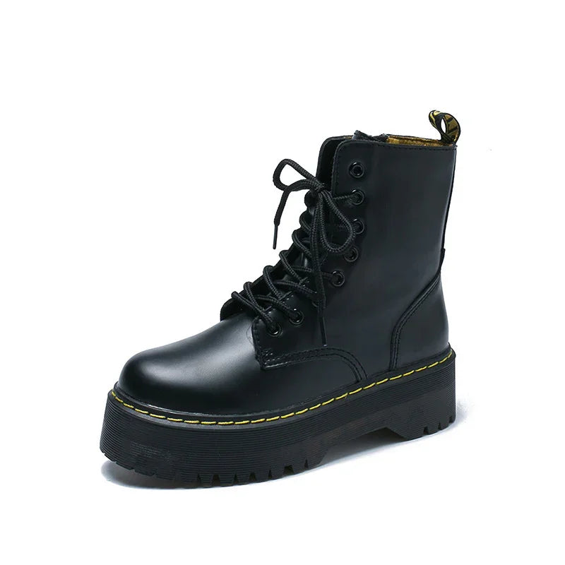 Black leather combat boot with thick platform sole and yellow stitching detail