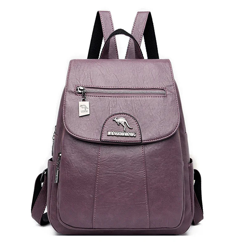 Purple leather backpack with front zip pocket and kangaroo logo on white background