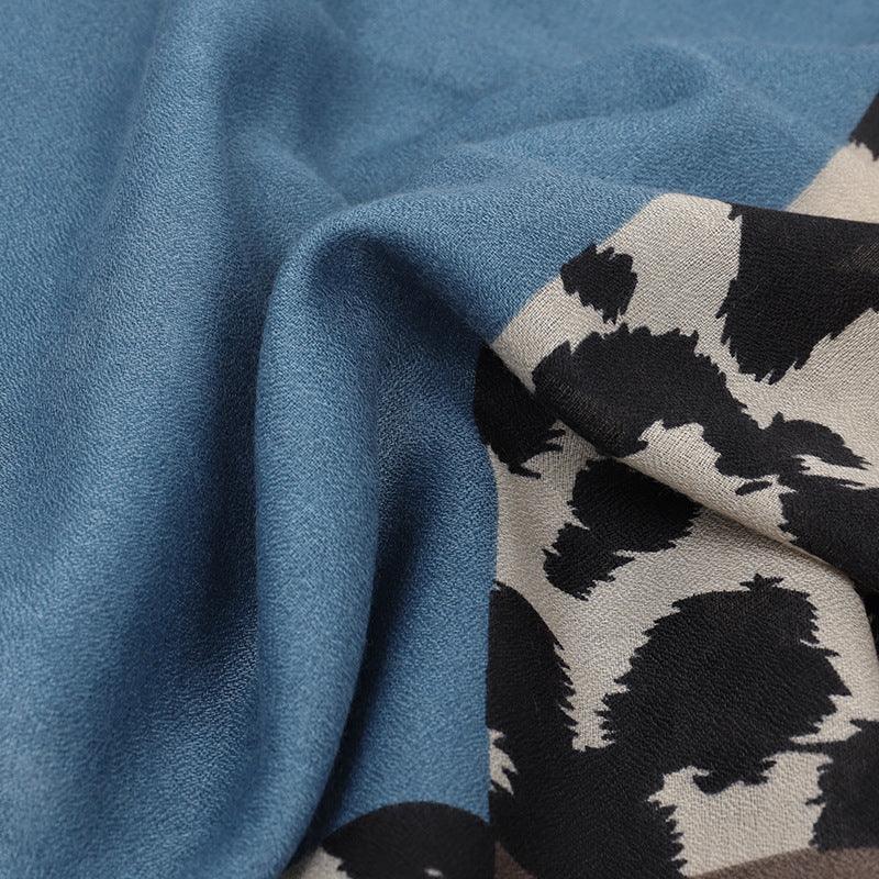 Soft blue fabric paired with black and white abstract floral patterned textile