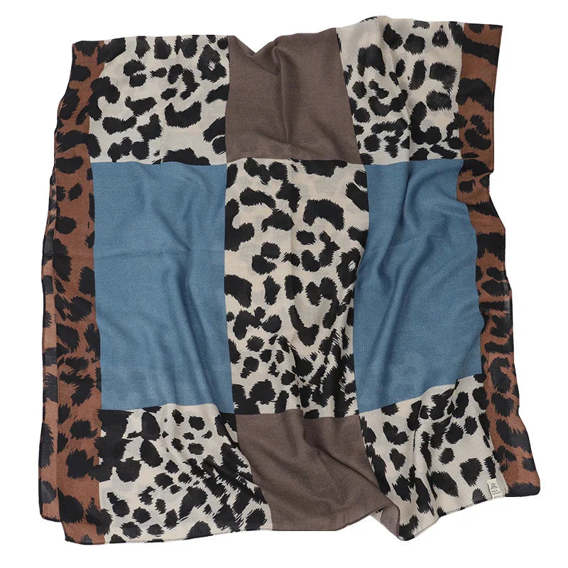 Soft fabric blanket with leopard print and blue and brown color blocks