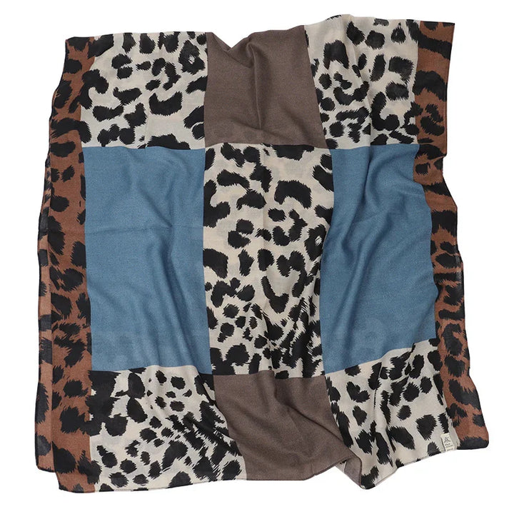 Soft fabric blanket with leopard print and blue and brown color blocks