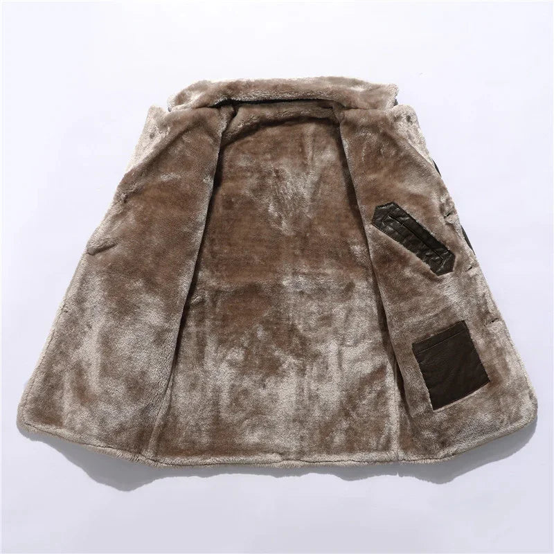 Soft brown faux fur coat interior with two leather patch pockets on white background