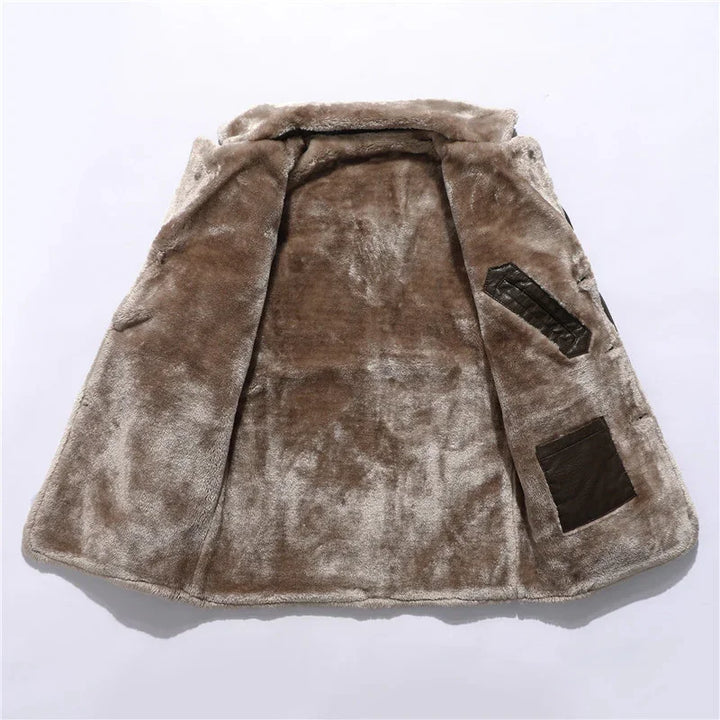 Soft brown faux fur coat interior with two leather patch pockets on white background