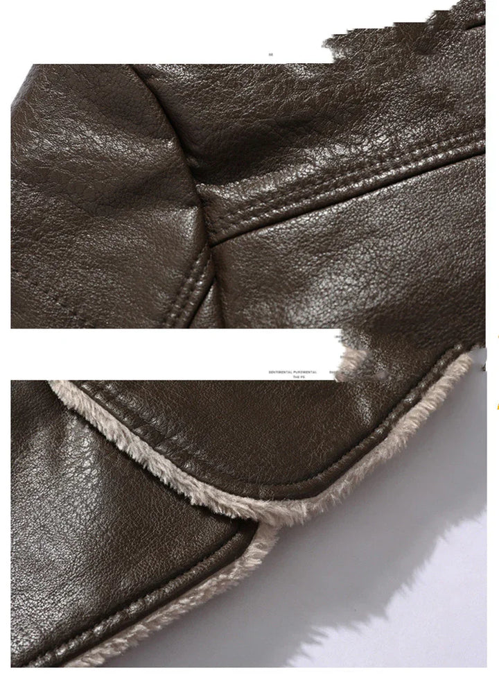 Close-up of dark brown leather with detailed stitching and light beige shearling trim