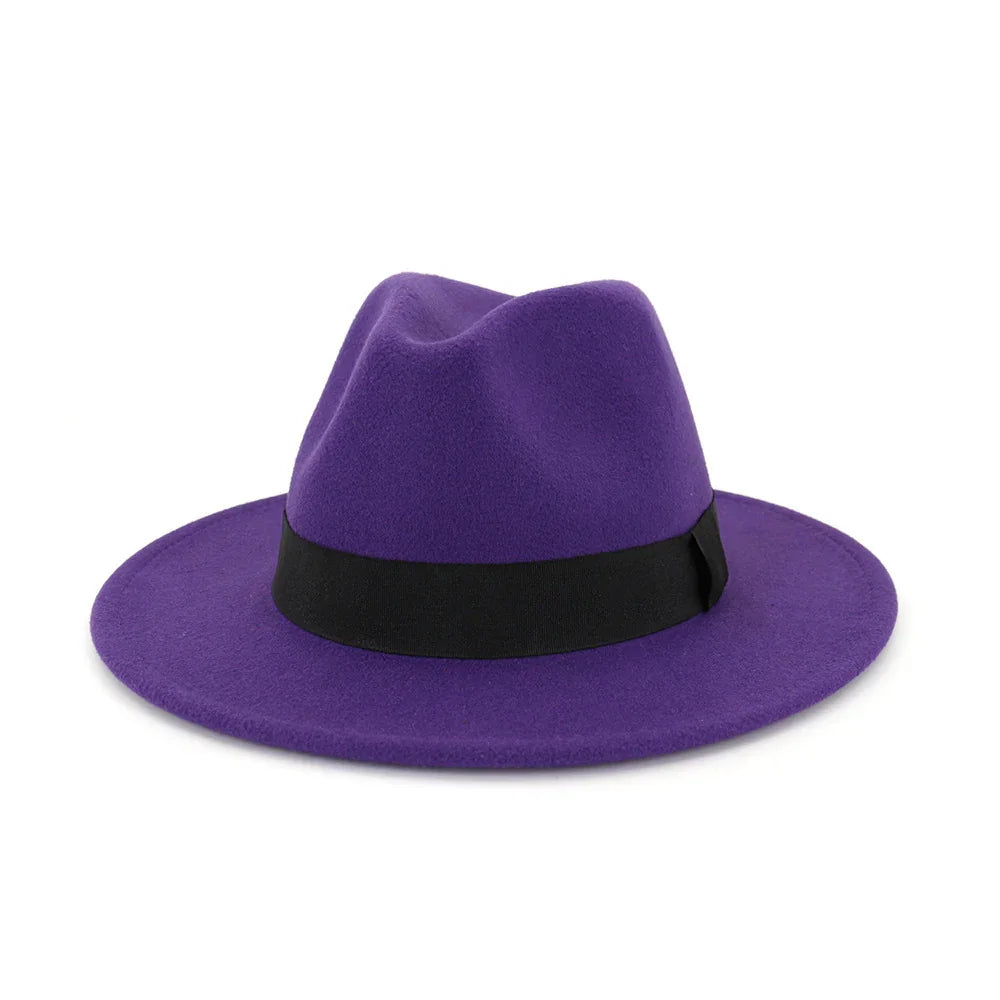 Purple fedora hat with wide brim and black ribbon band on white background