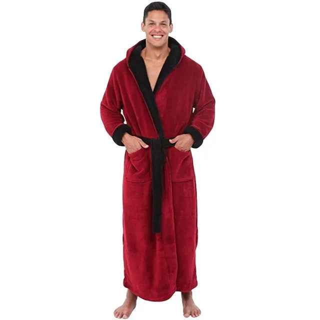 Smiling man wearing a long red and black plush bathrobe with pockets and a belt