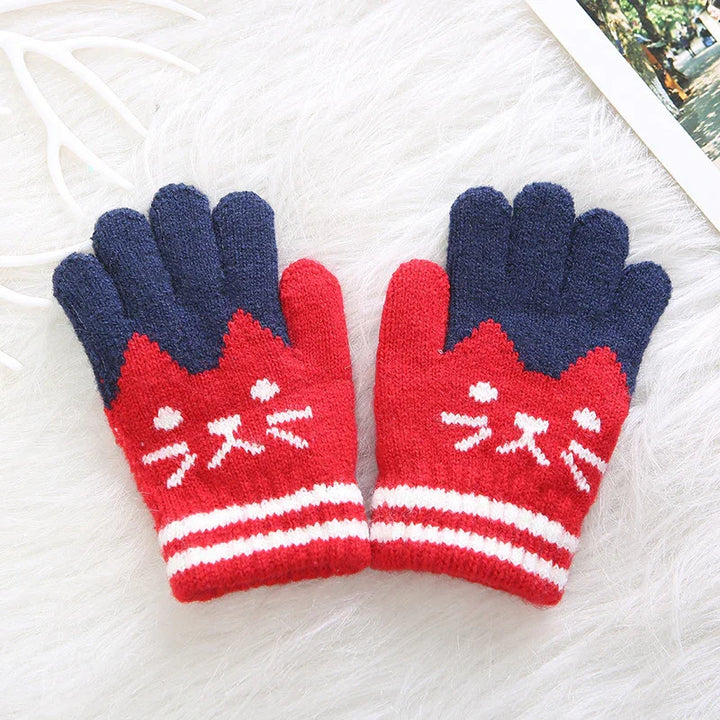Red and navy knitted gloves with cat face design and white stripes on cuffs, cozy winter accessory