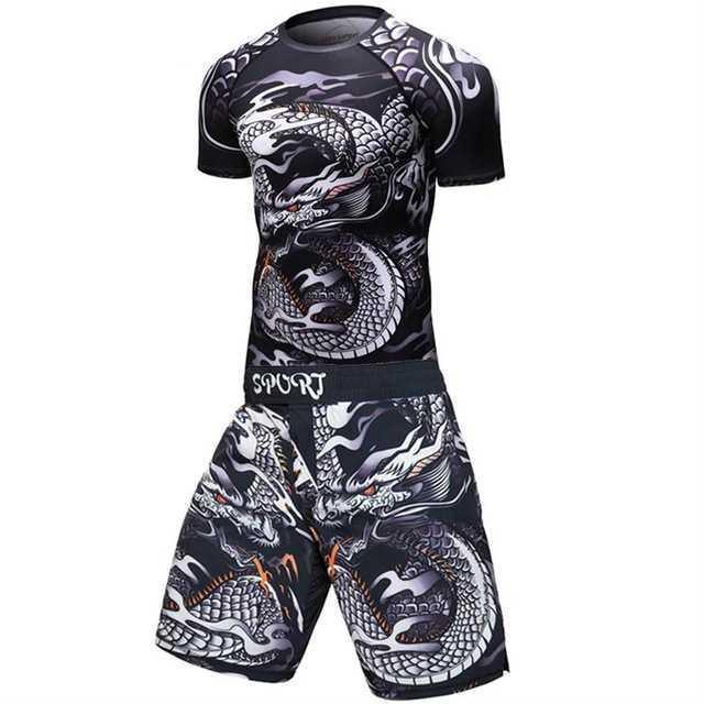 Black MMA rash guard and shorts set with white dragon graphic and bold patterns