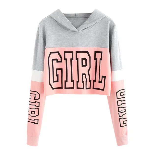Cropped gray and pink hoodie with GIRL text on chest and sleeves, casual streetwear fashion