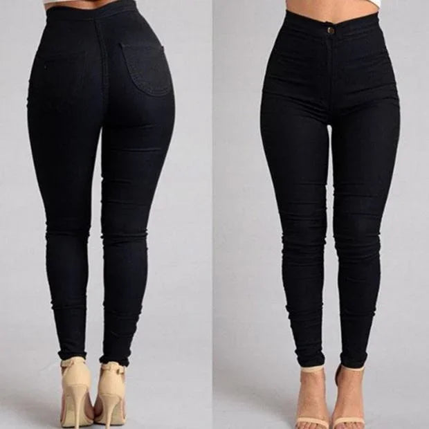 front and back view of high-waisted black skinny jeans worn with beige high-heeled sandals on neutral background