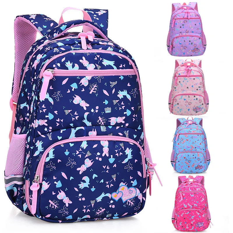 Colorful children's backpacks with animal and heart patterns in blue, pink, and purple colors