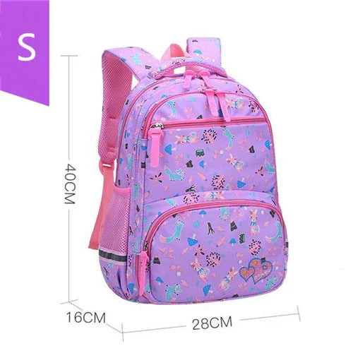 Small purple kids backpack with colorful animal and heart patterns, pink straps, and multiple zippered compartments