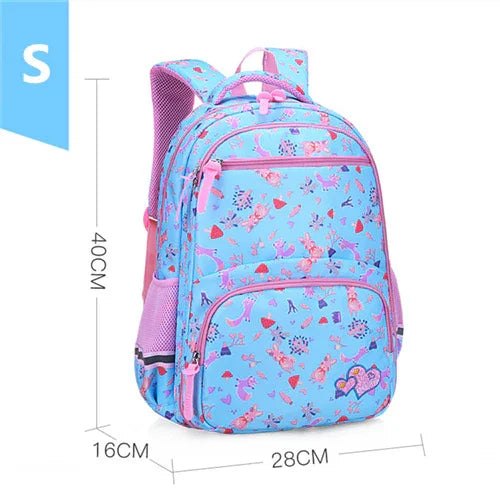 Small blue and pink kids backpack with floral and heart patterns, side mesh pocket, and multiple zip compartments