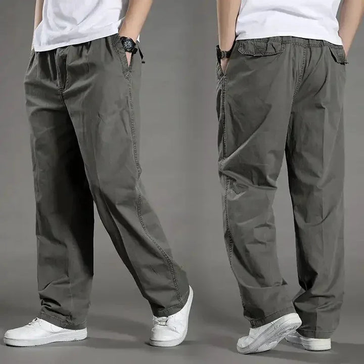 Men's casual loose-fit gray pants paired with white sneakers and a white t-shirt shown from front and back