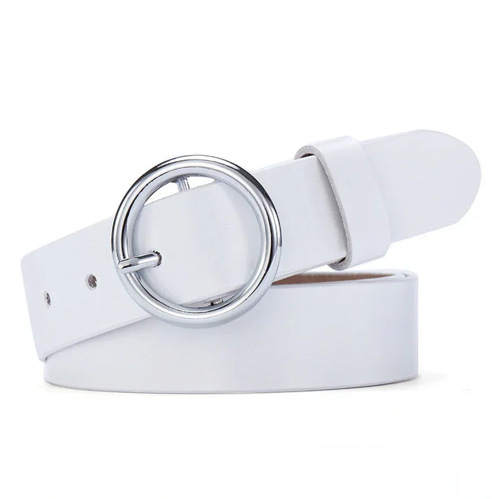 White leather belt with a shiny silver round buckle on white background