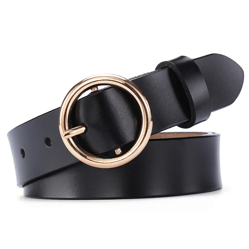 Black leather belt with round gold buckle on white background