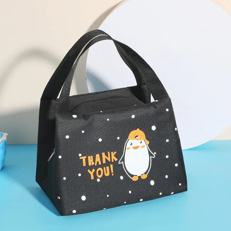 Black insulated lunch bag with cartoon penguin wearing a yellow cap and 'THANK YOU!' text