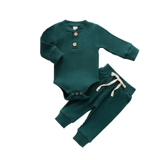 dark green ribbed baby bodysuit with wooden buttons and matching pants with white drawstring