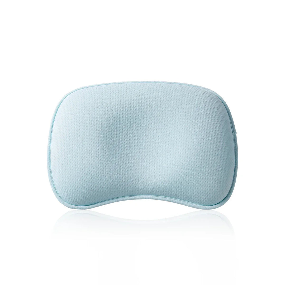 Light blue ergonomic memory foam pillow with curved design and breathable textured cover