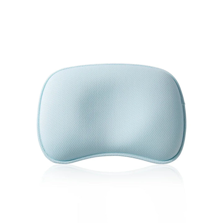 Light blue ergonomic memory foam pillow with curved design and breathable textured cover
