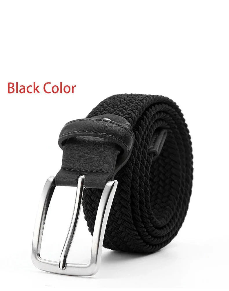 Black woven fabric belt with black leather loop and silver metal buckle on white background