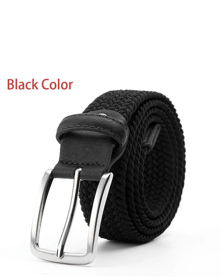Black woven fabric belt with black leather loop and silver metal buckle on white background