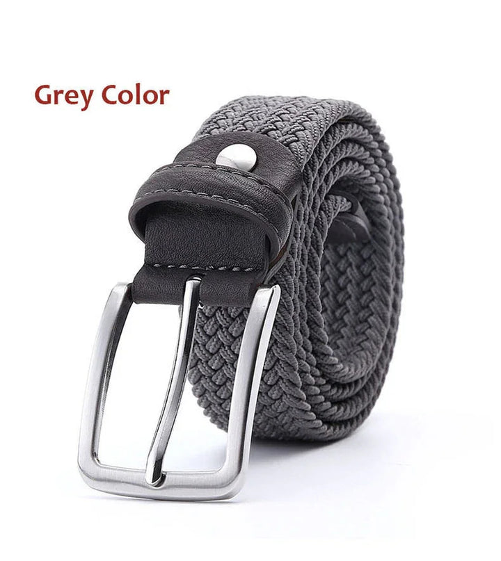 Grey woven fabric belt with black leather detailing and silver buckle on white background