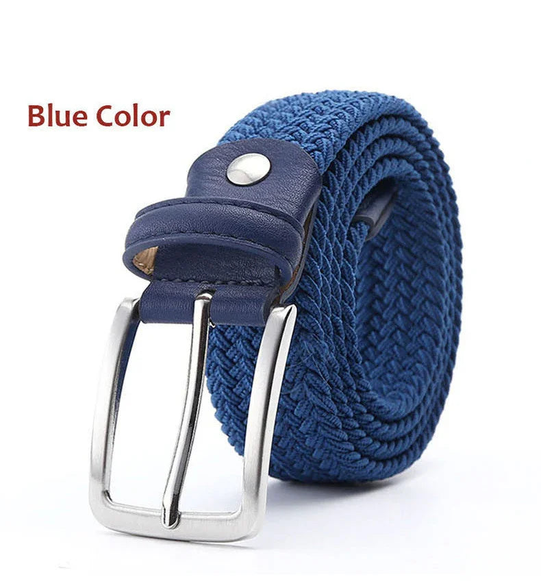 Blue woven fabric belt with leather details and silver metal buckle on white background