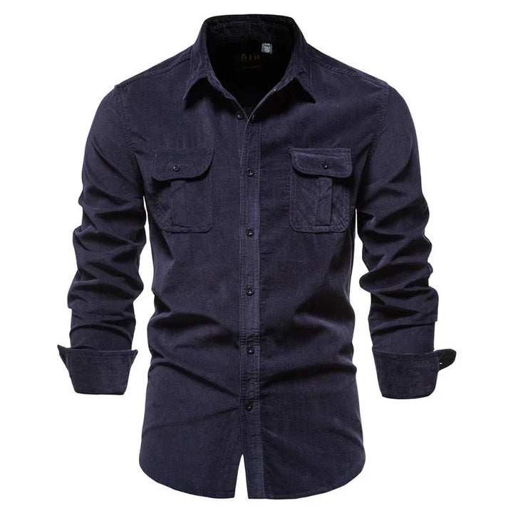 Men's dark navy blue corduroy long sleeve shirt with front pockets and button closure
