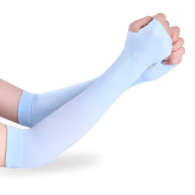 Light blue compression arm sleeves with thumb hole worn on both arms, seamless design for sun protection and sports