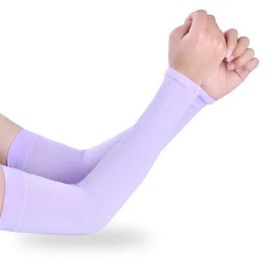 Pair of lavender arm sleeves worn on forearms with hands clenched, isolated on white background