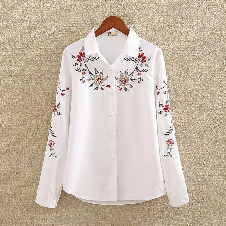 White long-sleeve shirt with red and beige floral embroidery on chest and sleeves