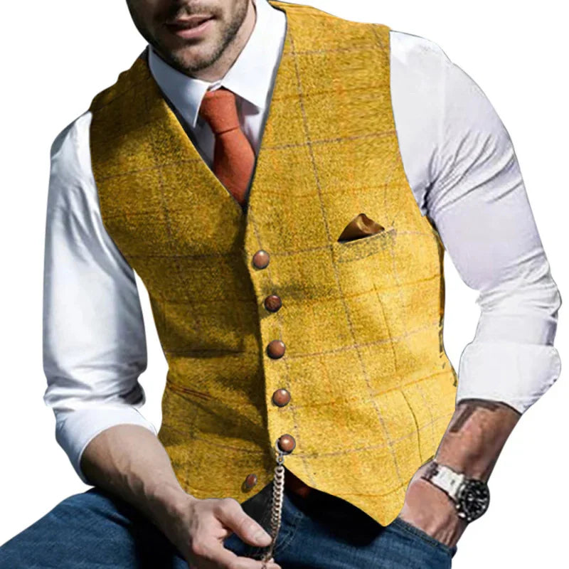 man wearing yellow plaid waistcoat with brown buttons, white shirt, orange tie, and watch