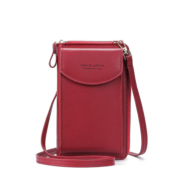 Red leather crossbody phone bag with flap pocket and adjustable strap, labeled Forever Carrken