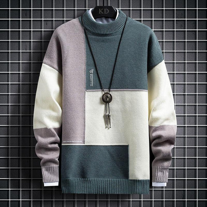 Men's color block knitted sweater in teal, gray, and cream with a round neck and pendant necklace