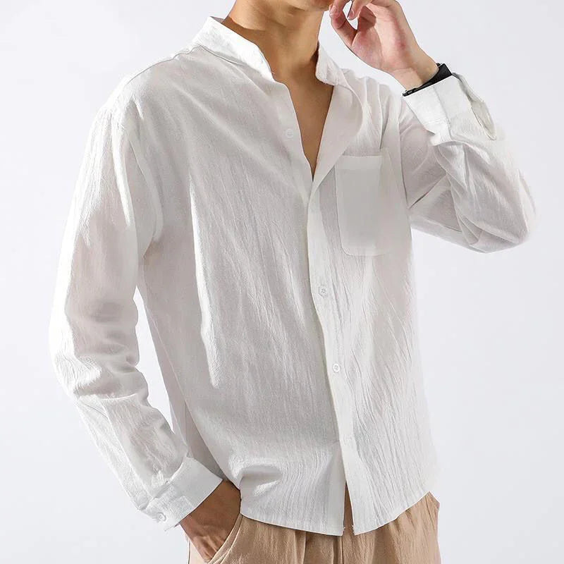 man wearing casual white long-sleeve linen shirt with mandarin collar and front pocket