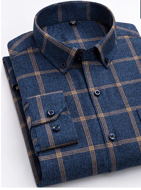 Folded blue plaid button-up shirt with brown check pattern and buttoned collar neatly displayed