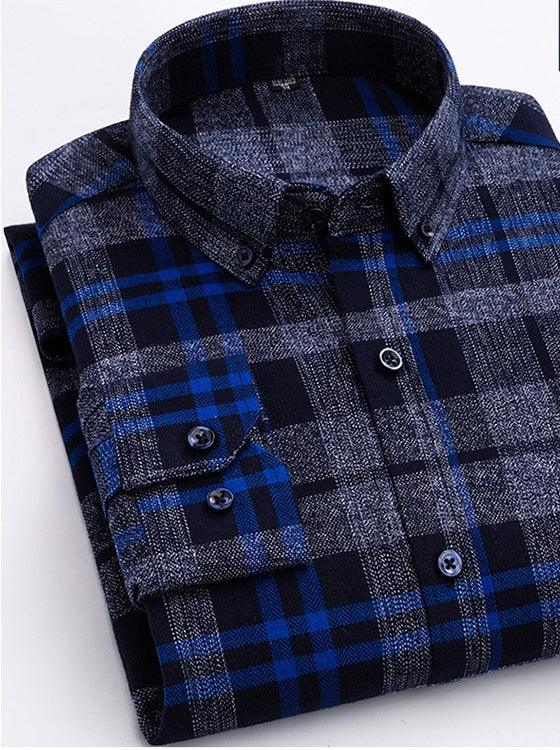 Folded men's button-up flannel shirt in blue and black plaid pattern with buttoned collar and cuffs