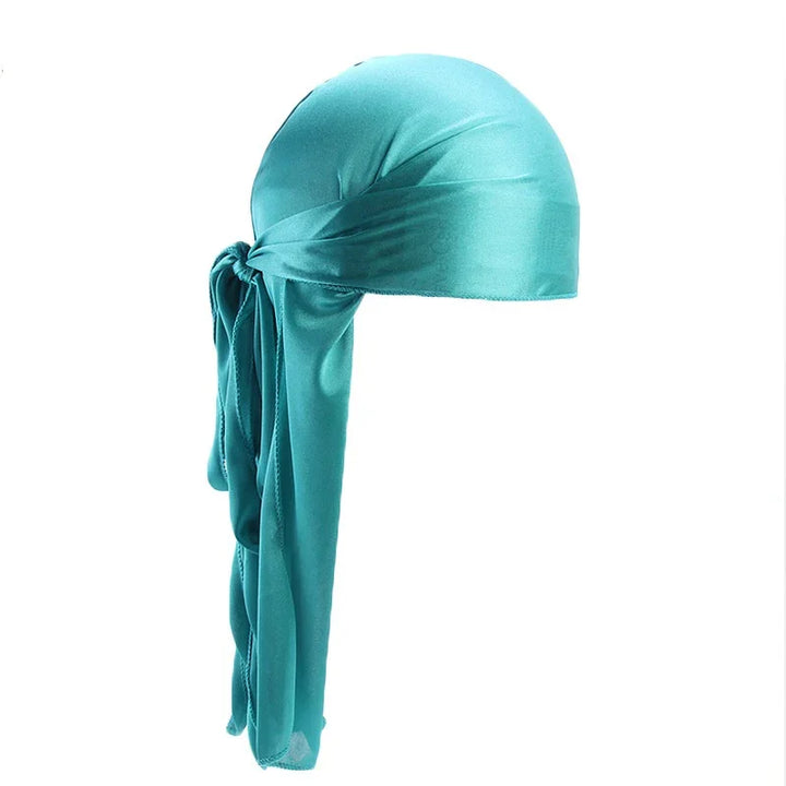 Teal blue satin durag with long tail and tied knot on white background
