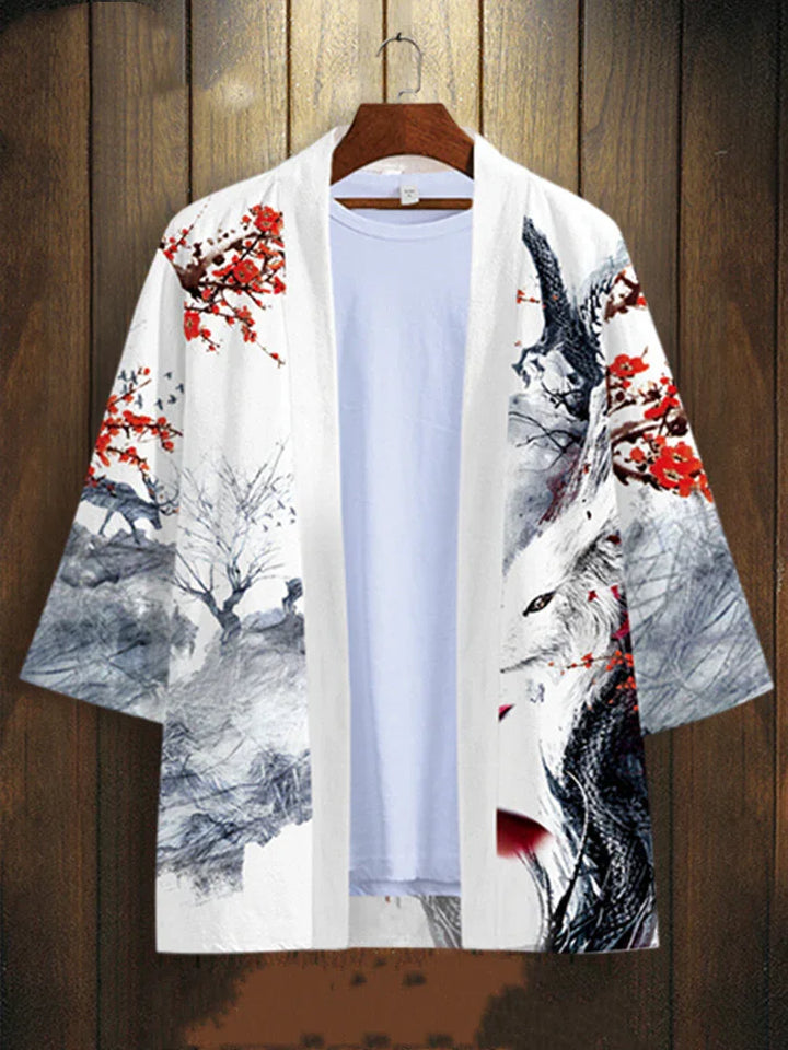 White kimono jacket with artistic red cherry blossoms, wolf, and bird designs on wood background