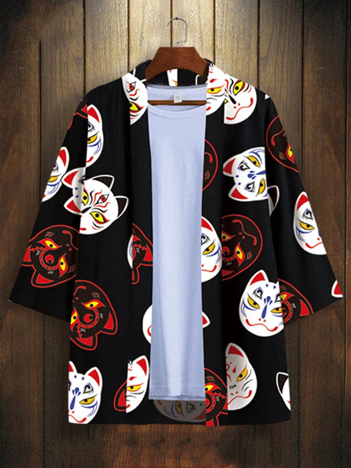 Black kimono jacket with colorful Japanese fox mask prints over a plain white t-shirt on a wooden hanger