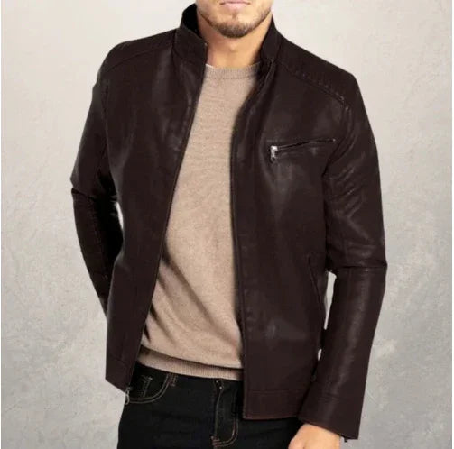 man wearing dark brown leather biker jacket with zippered chest pocket over beige sweater