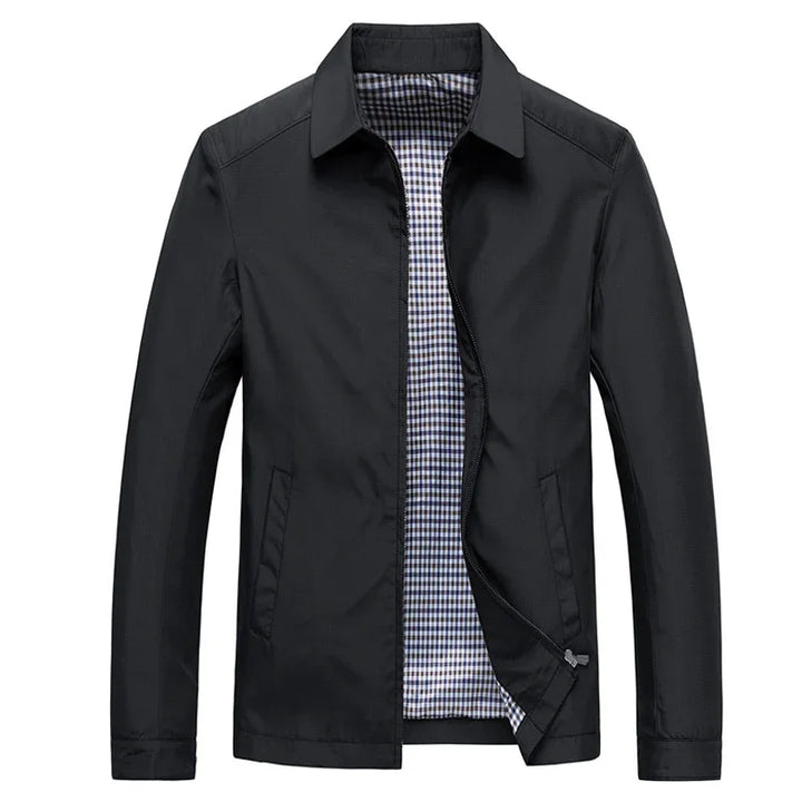 Black casual men's jacket with checkered inner lining and front zipper on white background