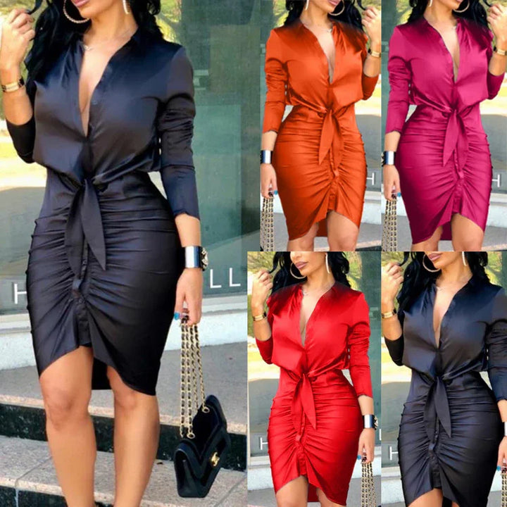 Woman modeling ruched satin bodycon dress with tie waist in black, orange, pink, and red colors