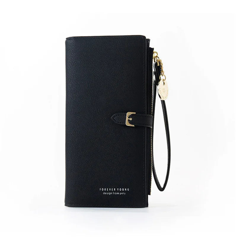 Black Forever Young wristlet wallet with gold buckle and zipper charm on white background